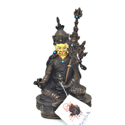 Guru Rinpoche Statue made with an antique finish and gold leaf face. Made in Nepal.